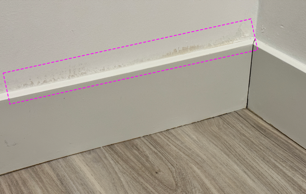 Missed area above baseboard