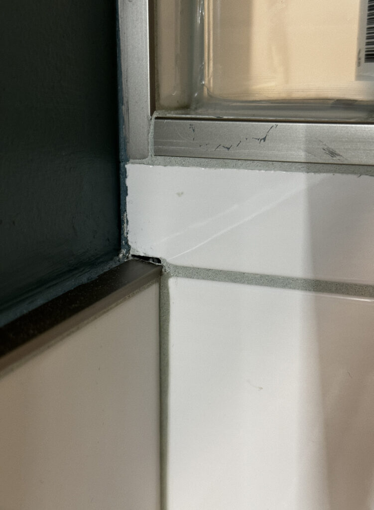 Tile cut short (and paint on schluter and tile)