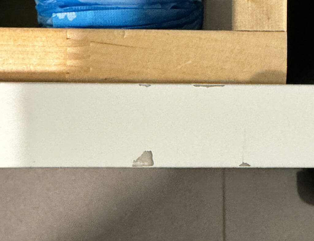 Damage to bottom vanity drawer (right side)