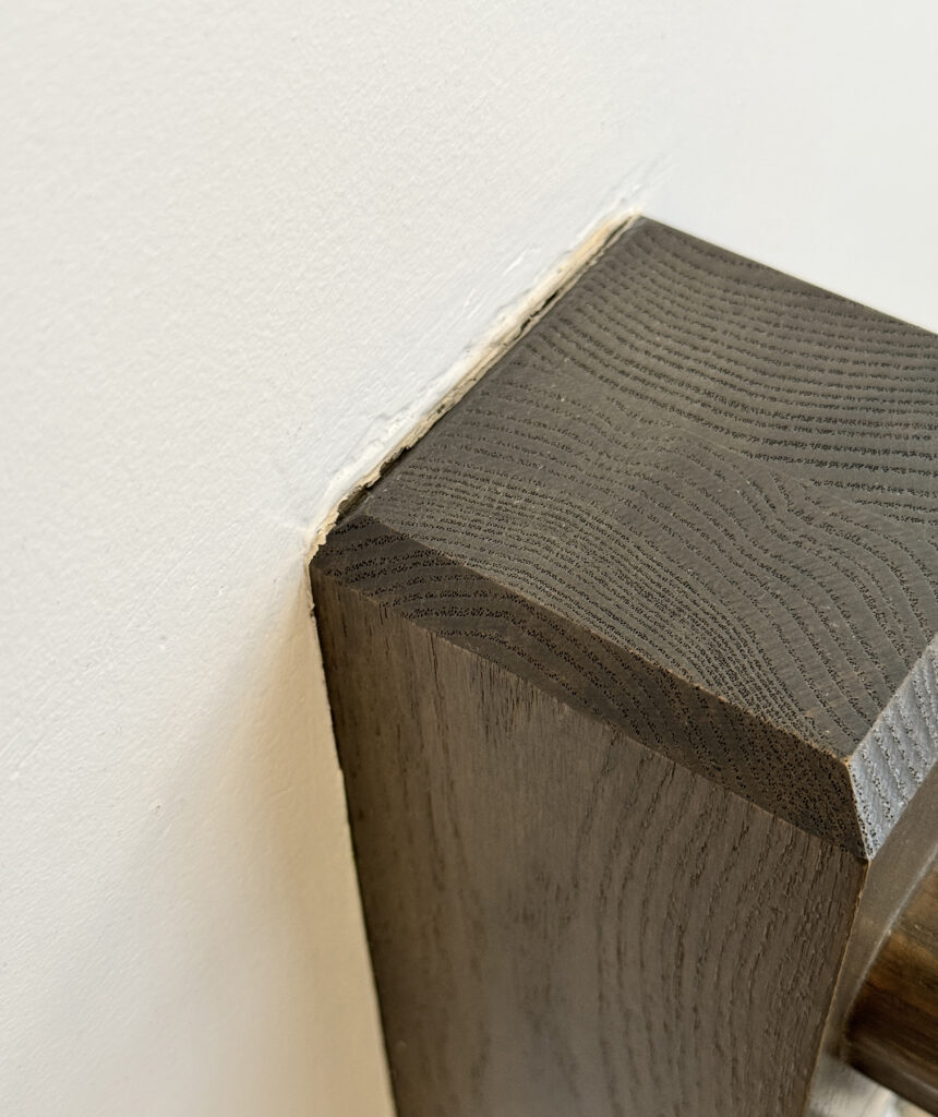 No sanding or paint where the old post was ripped out