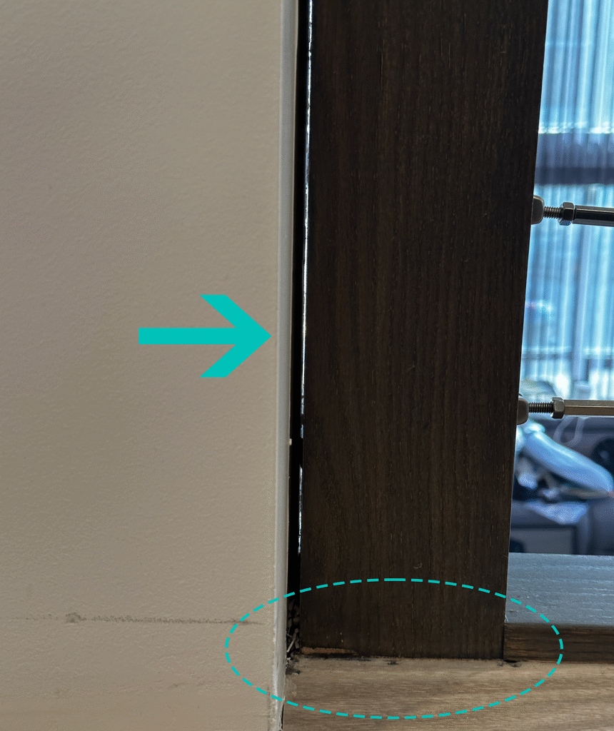 Visible daylight between the pillar and post (note the stain on the floor and bare spots on post)