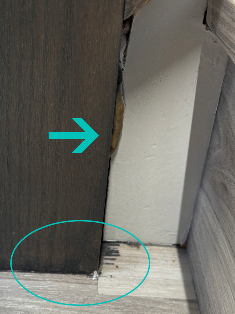 Stain on the floor and gap between stairs and post